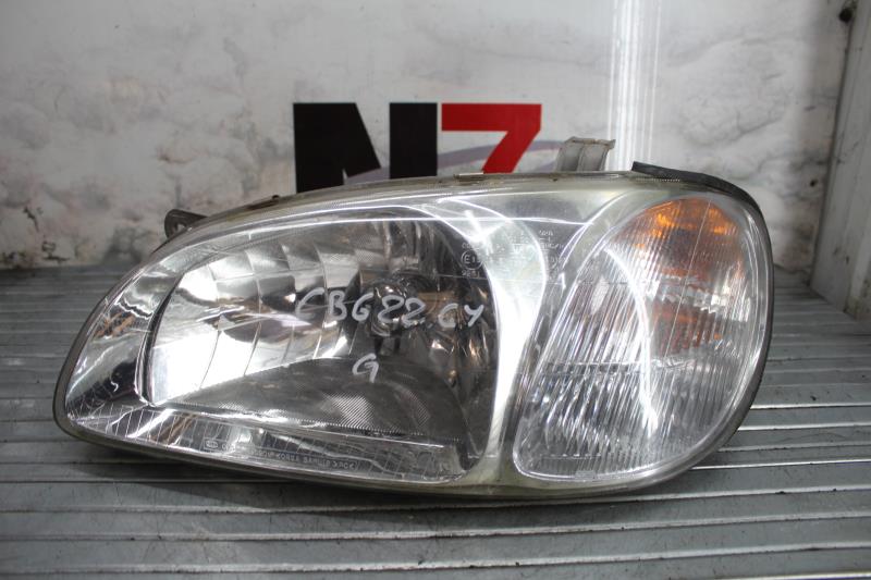 Optique avant principal gauche (feux)(phare) KIA CARNIVAL 1 Diesel