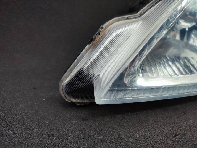 Optique avant principal gauche (feux)(phare) SUZUKI LIANA Essence